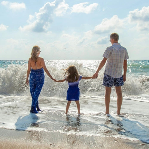 Image of a family on the beach